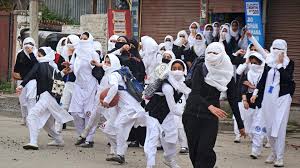 Kashmiri girls engaged in pitched street battles